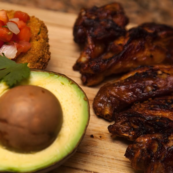 Bill's Grill Smokehouse BBQ chicken wings, a fried appetizer with salsa, and a sliced avocado.